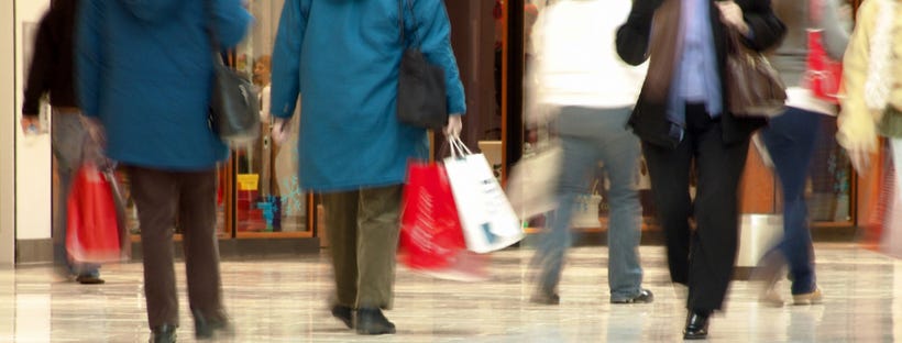 Shoppers inside a mall