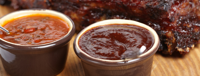 BBQ sauces served with glazed ribs
